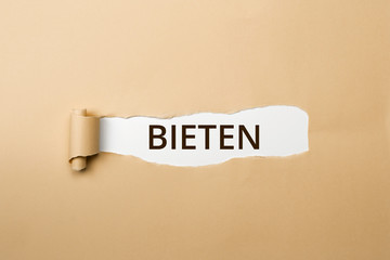 BIETEN Schriftzug - aufgerissenes Papier