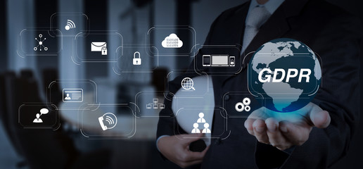 businessman hand shows the earth as construction concept