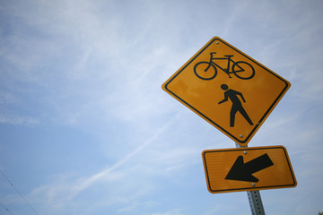 Yellow Bicycle and Pedestrian Crossing Street Sign Isolated