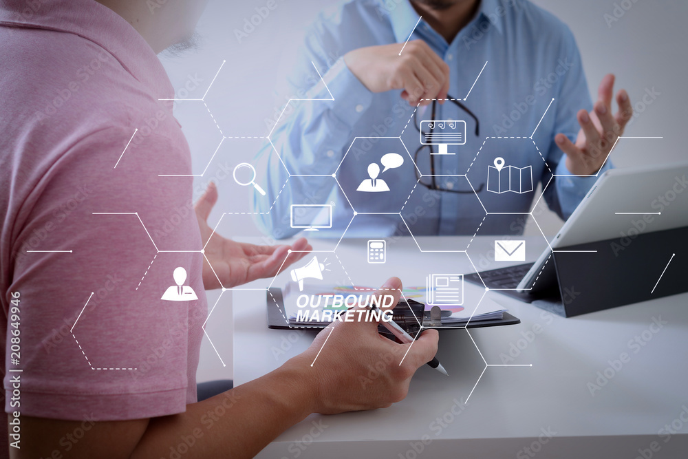 Poster Businessmen working together on a document and using smart phone and digital tablet and laptop computer in modern office