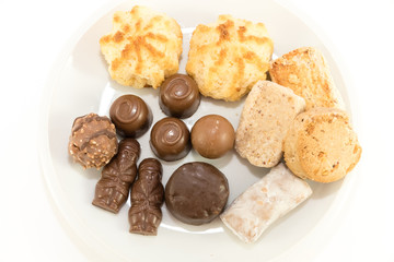 Polvorones typical spansih and chocolate sweets on white background