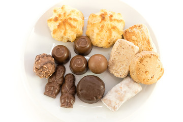 Polvorones typical spansih and chocolate sweets on white background