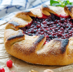 Homemade pie (Galette) with cranberries and walnuts.