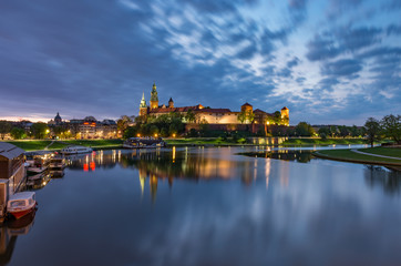 Fototapeta na wymiar Wawel Castle in Krakow, Poland, seen from the Vistula boulevards in the morning