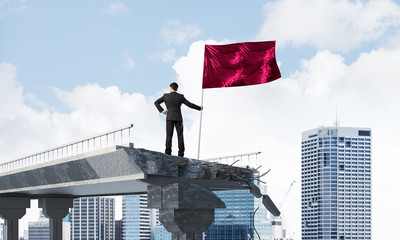 Man with flag presenting leadership concept.