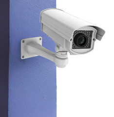 Security camera on the blue wall