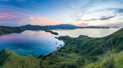 A panoramic view from the top view of 'Gili Lawa' after sunset, Komodo Island (Komodo National Park), Labuan Bajo, Flores, Indonesia - obrazy, fototapety, plakaty