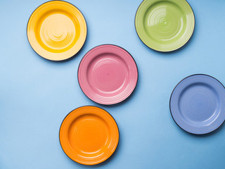 Colorful ceramic dishes. Flat lay tableware set concept