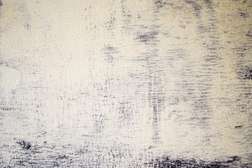 White plaster with blue showing through