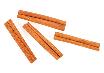 Fragrant cinnamon sticks isolated on white background, top view.