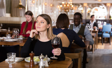 Woman is dining alone