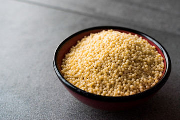 Raw Dry Organic Couscous in a Bowl