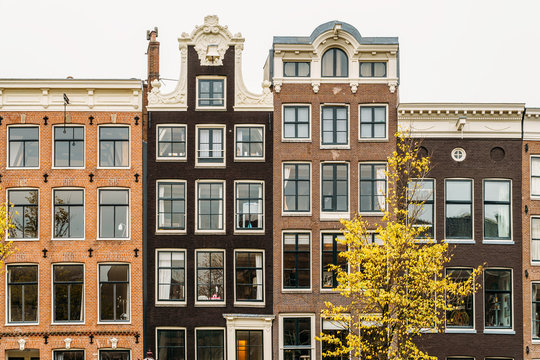 Dutch Houses Facade In Downtown Amsterdam City