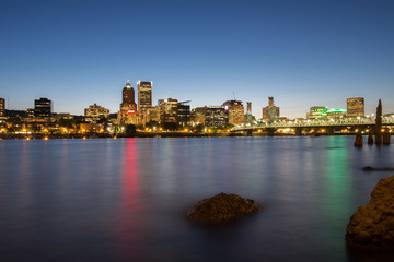 Naklejka premium Waterfront city skyline at night
