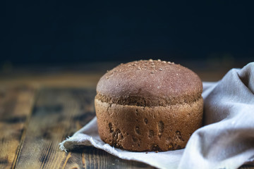 freshly baked bread on dark gray kitchen table Rustic style