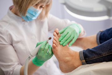 podiatrist treats foot.