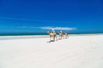 Mother and kids at tropical beach