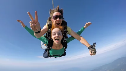 Foto op Canvas Skydiving tandem happiness © Mauricio G