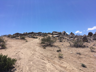In the mountains of California in the summer. Stones, sand, sun