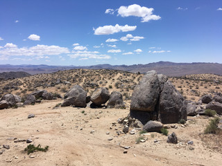 In the mountains of California in the summer. Stones, sand, sun