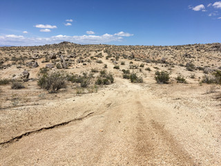 In the mountains of California in the summer. Stones, sand, sun