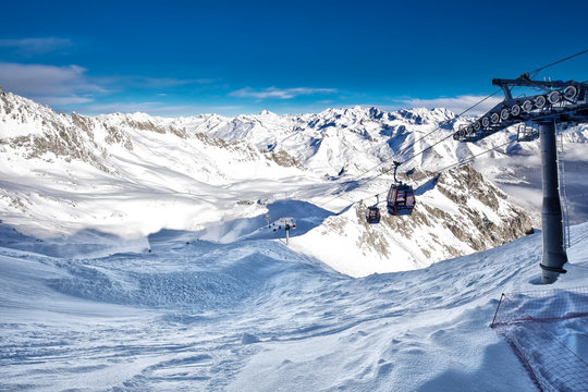 Stunning winter panorama in Tonale ski resort. View of Italian Alps from Adamelo Glacier, Italia, Europe.