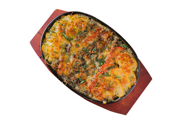 Baked potato with mushrooms and cheese in a frying pan on a white background