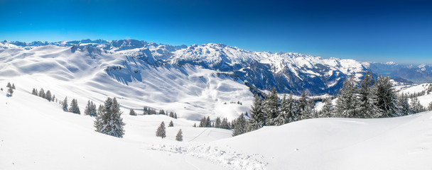 Swiss Alps covered by fresh new snow seen from Hoch-Ybrig ski resort, Central Switzerland