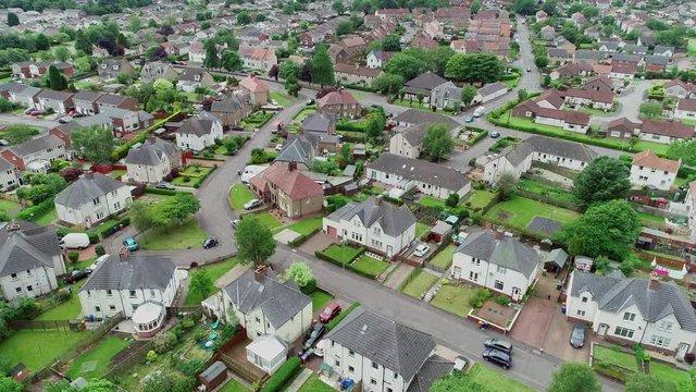 Aerial footage of the village of Milton of Campsie near Glasgow in Scotland.