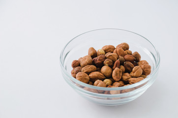 Hazelnuts in a glass bowl