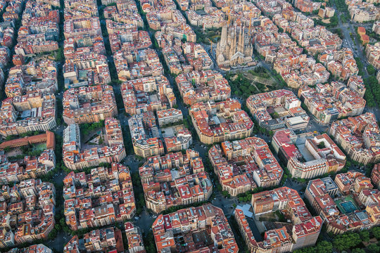 Aerial view of Barcelona Eixample residencial district with famous urban grid, Spain