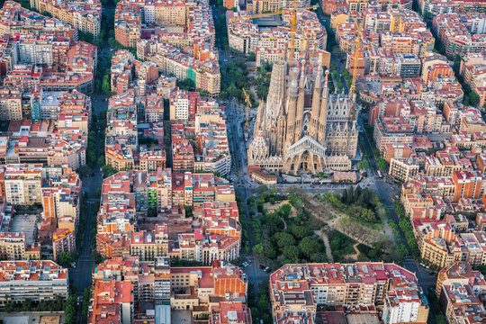 Barcelona aerial view, Eixample residencial district and famous Sagrada Familia Basilica, Spain