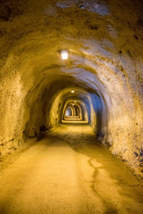 Fototapeta premium Long winding tunnels in the high mountain.