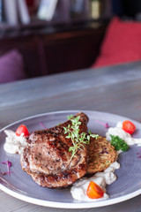 loin of calf on zucchini salad with Roquefort sauce