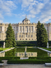 North facade of Royal Palace of Madrid (Palacio Real) at sunset. View from Jardines de Sabatini Gardens. Madrid, Spain.