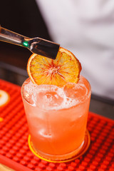 A glass of fresh Aperol Spritz closeup