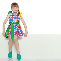 Girls looks because of the white obstacle.