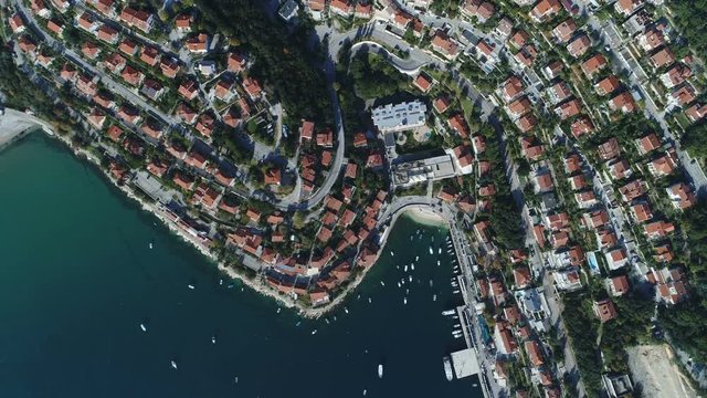 Overhead aerial view of expensive villas in popular neighborhood in coastal town of Rabac in Croatia