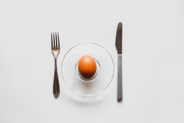 Fresh, raw eggs on a white background. Minimalism and ecology. Healthy lifestyle.