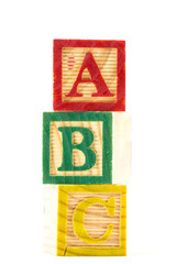 The wooden alphabet blocks on a white background