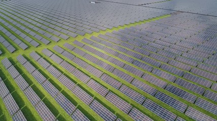 Flying over solar panels in Germany, a country that invested heavily in sustainable renewable energy in recent years and decades