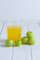 Indian gooseberry on wooden table