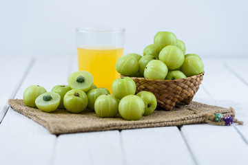 Indian gooseberry on wooden table