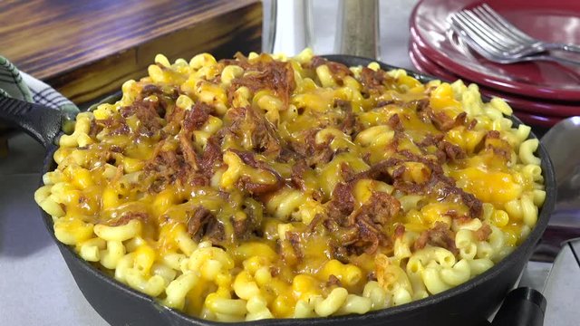 Skillet of macaroni and cheese with barbecue beef
