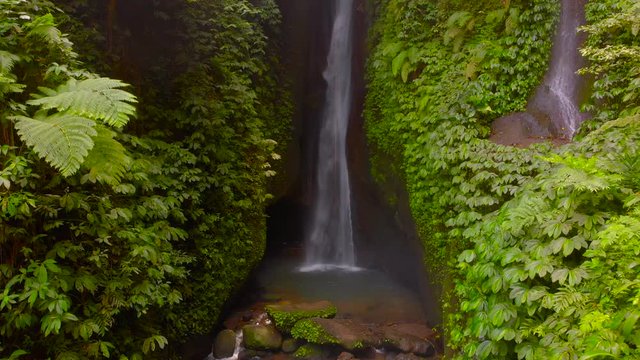 Aerial View of the Leke Leke waterfall in jungles of Bali, Indonesia
