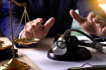 Law gavel stethoscope Health care business rules