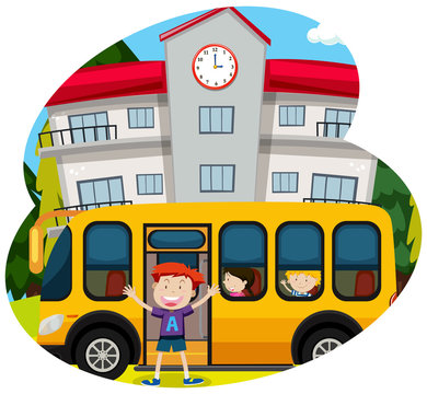 Happy boy infornt of a school bus