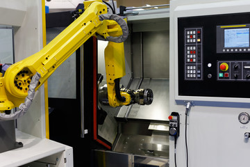 CNC lathe machine and robot