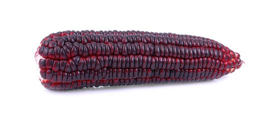 Fresh purple corns isolated on a white background.