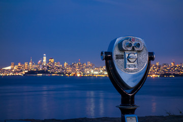 Sightseeing viewfinder at Vista Point near Golden Gate Bridge with San Francisco city skyline at...